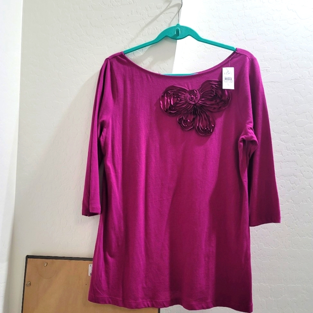 Purple shirt.